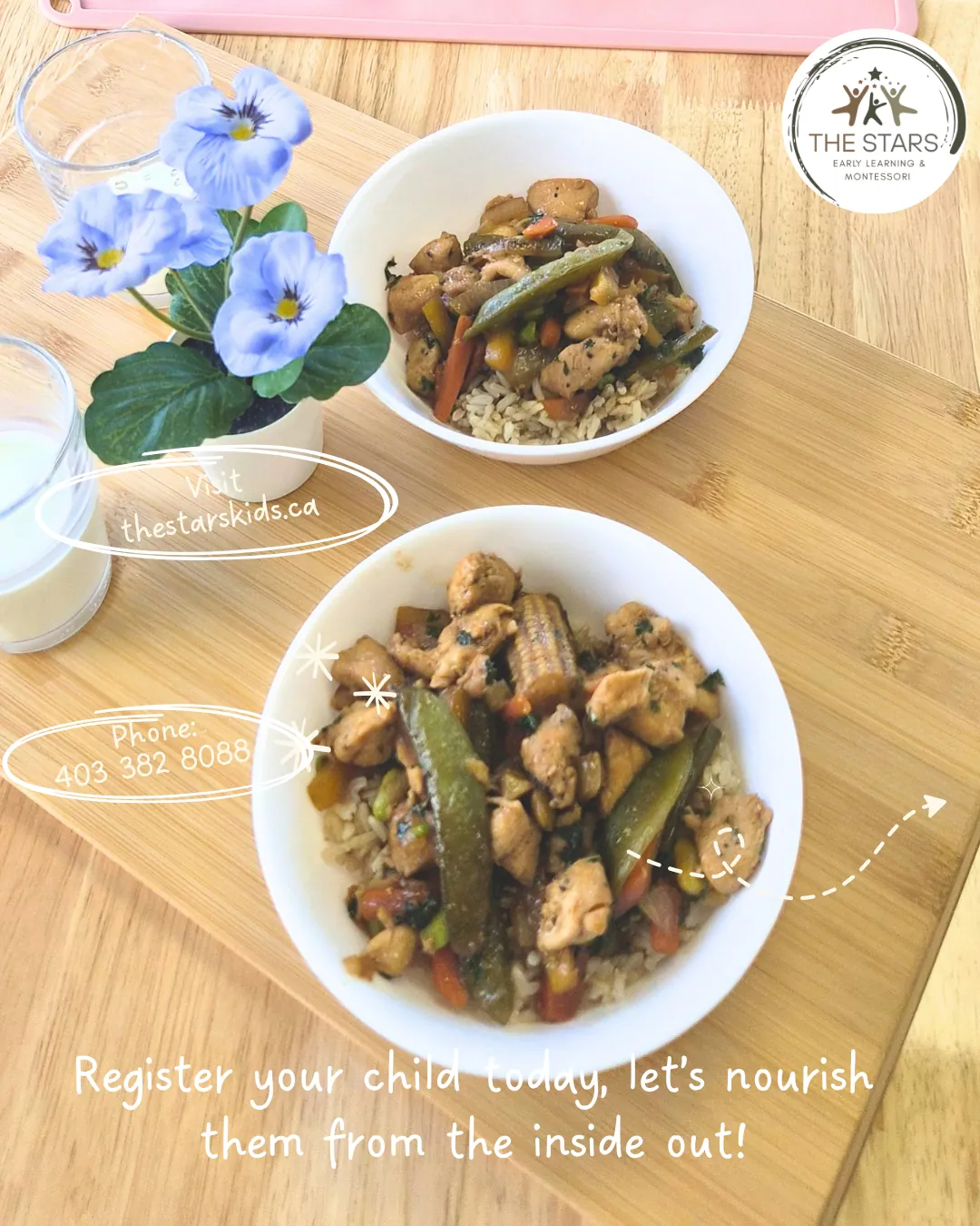 Two bowls of chicken and vegetable stir-fry with snap peas and baby corn on brown rice, a glass of milk and a flower pot on a wooden board, with our phone number and website